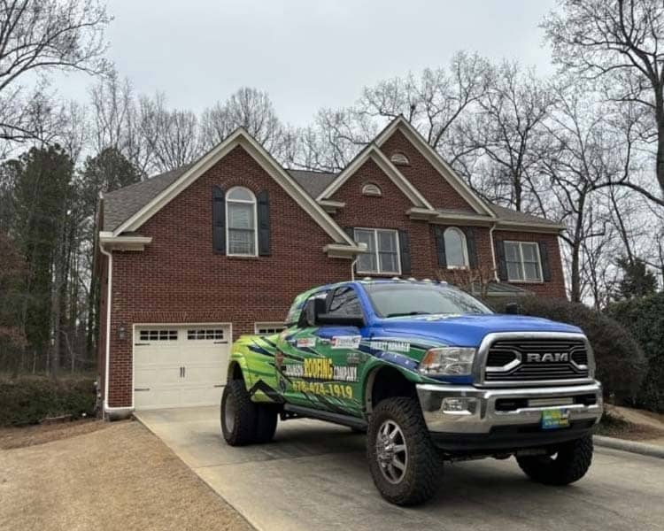 Adamson Truck in front of house
