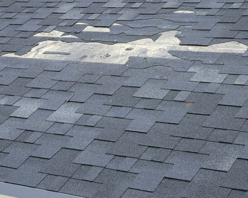 wind damaged shingles